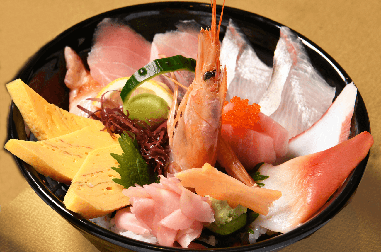 ⑬自家製甘ダレが決めて♪ 彩り豊かな海のごちそう